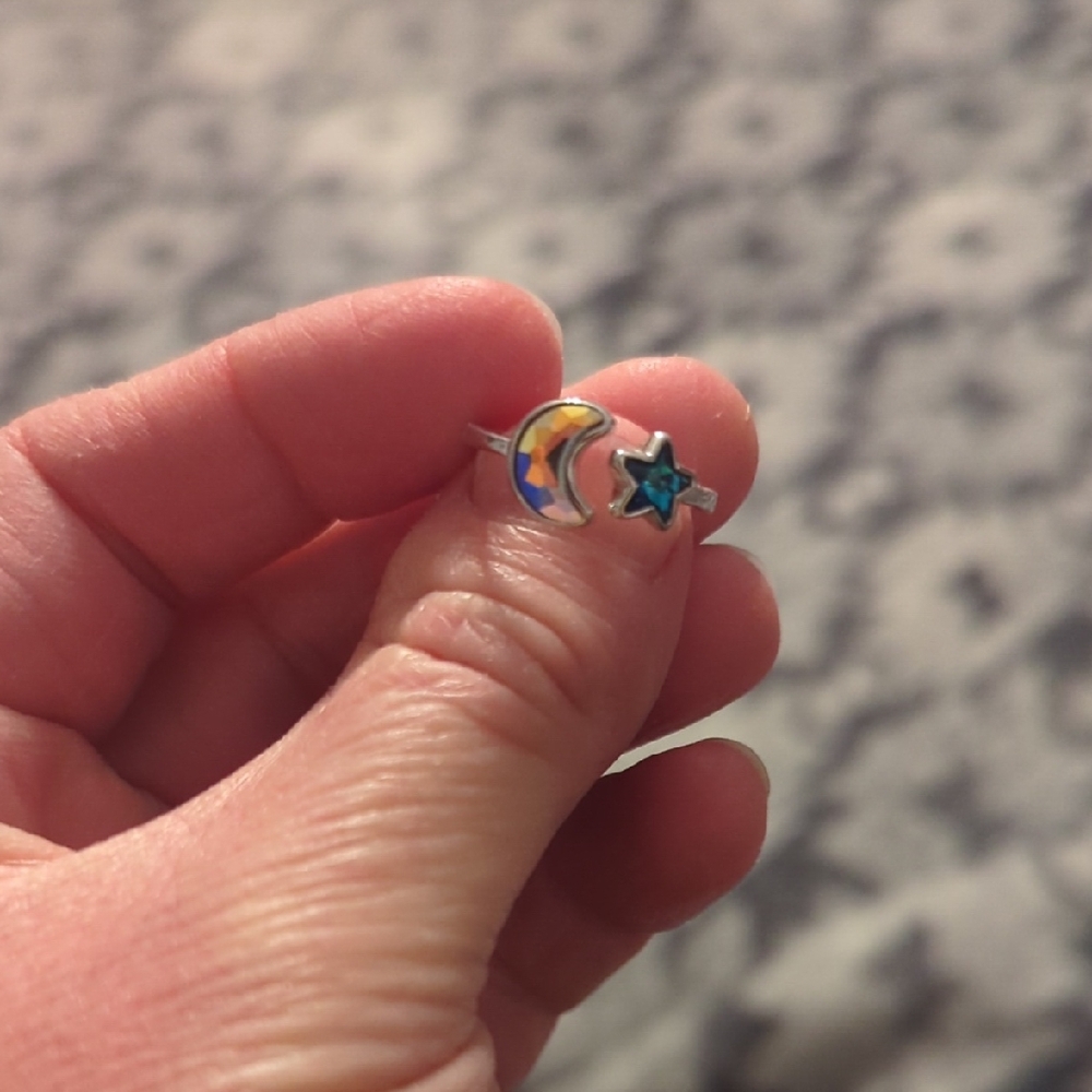 Silver Ring with Moon and Star Design